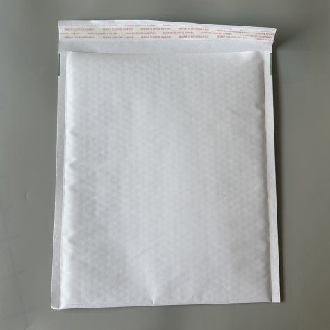 white-kraft-paper-bubble-mailer-back-adhesive-strip