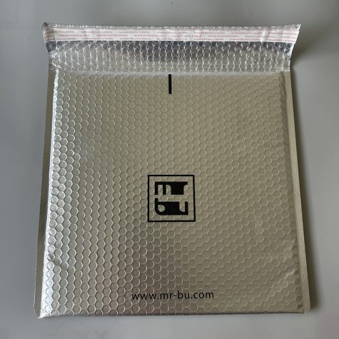 open-vertical-silver-bubble-mailer-adhesive-strip