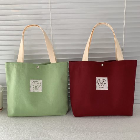 green-and-burgundy-puppy-patch-canvas-bags
