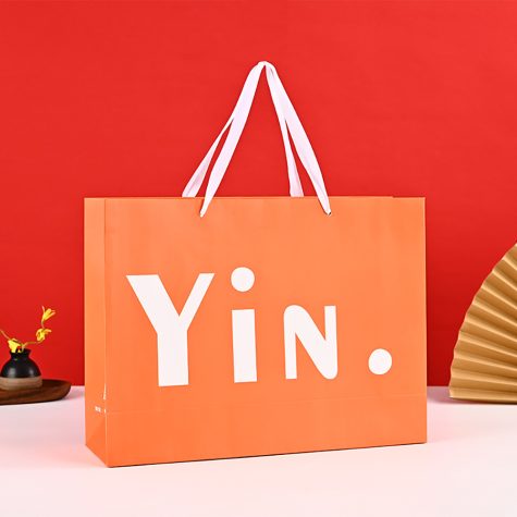 yin-printed-orange-paper-bags-with-handles